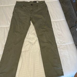 Faded green volcom jeans